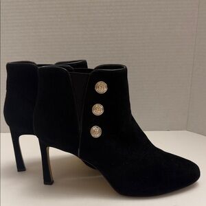 White House Black Market Black Ankle Boots with Gold side buttons.